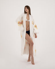 Authentic Turkish cotton evil eye robe with traditional weave and fringe detail.