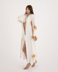 Authentic Turkish cotton evil eye robe with traditional weave and fringe detail..