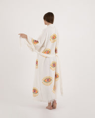 Authentic Turkish cotton evil eye robe with traditional weave and fringe detail..